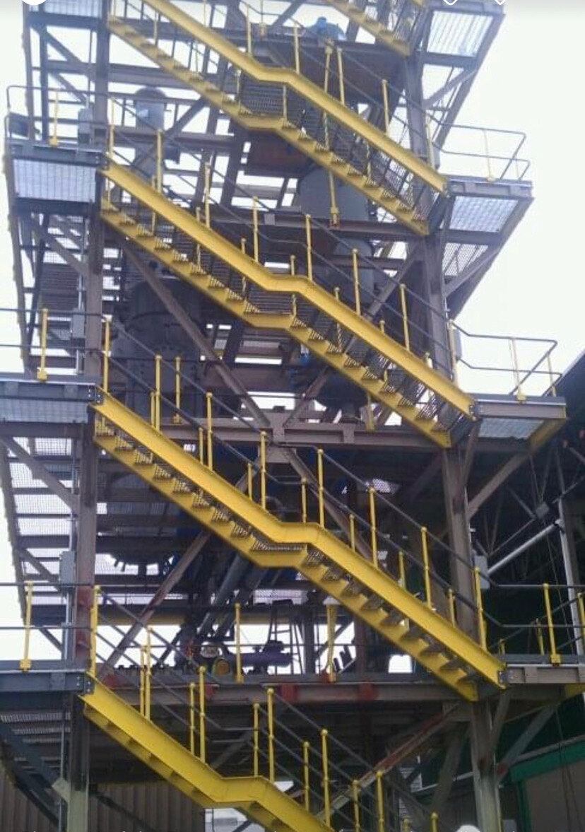 Industrial structure with stairs and access platforms