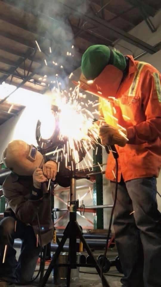 Fabrication crew working in a shop environment
