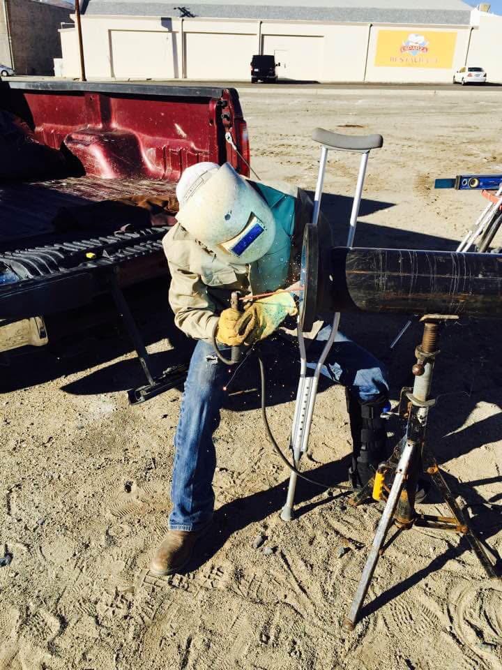 Crew performing on-site welding work