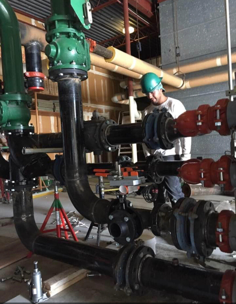 Mechanical piping installation at resort facility